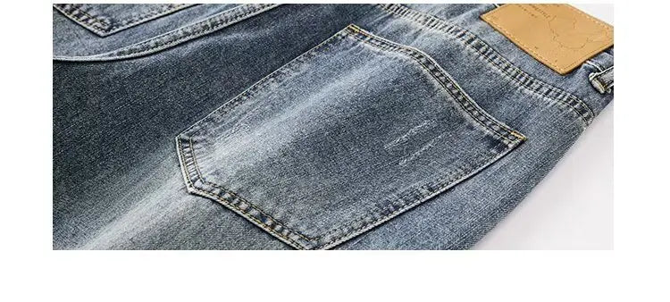 New Men's Ripped Jeans Baggy Straight Fashion Vintage Blue Denim Pants Personality Streetwear Hip Hop High Quality Male Trousers